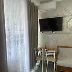 Next To The In *
